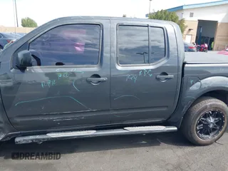 2014 Nissan Frontier SV with VIN 1N6AD0ER8EN756702, listed as a IAAI auction lot 42021294 with 135,143 mi miles and . Bid and sale history available at DreamBid. Image 18.