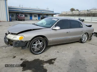 1999 Lincoln Continental with VIN 1LNHM97V0XY705160, listed as a Copart auction lot 45599145 with 187,931 mi miles and Salvage Title. Bid and sale history available at carsss.com. Image 1.