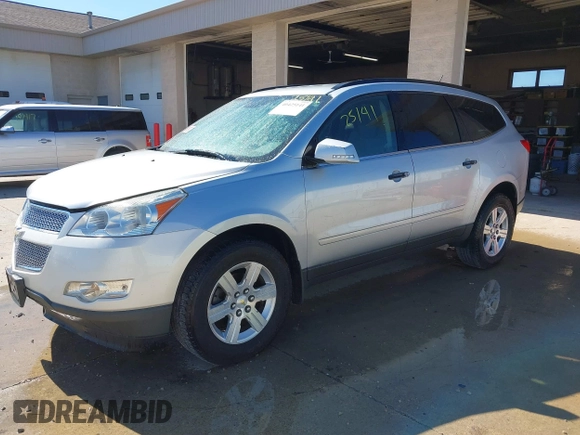2012 Chevrolet Traverse 1LT with VIN 1GNKRGED5CJ370286, listed as a IAAI auction lot 40425141 with 125,280 mi miles and . Bid and sale history available at DreamBid. Image 2.