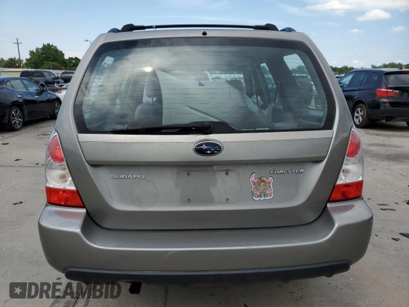 2006 Subaru Forester X with VIN JF1SG65656H709849, listed as a Copart auction lot 59811325 with 198,659 mi miles and Salvage title. Bid and sale history available at DreamBid. Image 6.