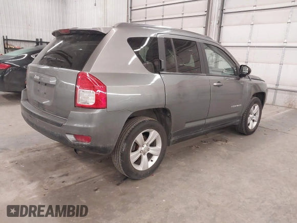 2013 Jeep Compass Sport with VIN 1C4NJDBBXDD225517, listed as a IAAI auction lot 41271099 with 168,204 mi miles. Bid and sale history available at carsss.com. Image 4.