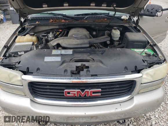 2004 GMC Yukon SLE with VIN 1GKEK13V14J136414, listed as a Copart auction lot 77021464 with 262,143 mi miles and Salvage Title. Bid and sale history available at carsss.com. Image 12.
