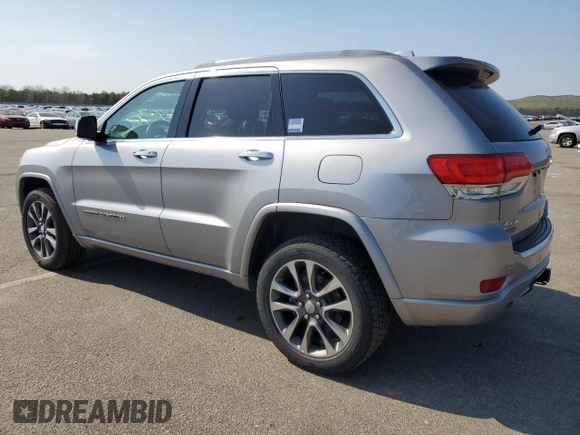 2018 Jeep Grand Cherokee Overland z VIN 1C4RJFCM3JC401399, wystawiony jako Copart lot #53167035 z przebiegiem 87 886 mil mil oraz Nie do naprawy • Non repairable. Historia ofert i sprzedaży dostępna na DreamBid. Obrazek 2.