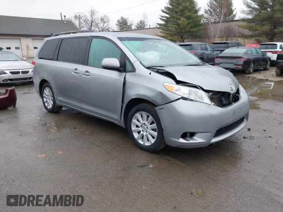 2012 Toyota Sienna LE with VIN 5TDJK3DCXCS040253, listed as a IAAI auction lot 41957623 with 164,780 mi miles. Bid and sale history available at carsss.com. Image 1.