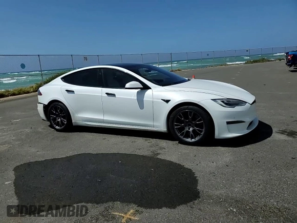 2021 Tesla Model S Plaid с VIN 5YJSA1E66MF453717, выставлен на аукционе Copart как лот 49330355 с пробегом 64 458 миль миль и Списание • Salvage title. История ставок и продаж доступна на DreamBid. Изображение 11.