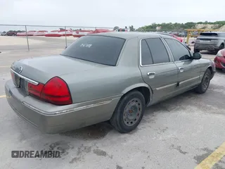 2003 Mercury Grand Marquis GS Convenience z VIN 2MEFM74W83X678151, wystawiony jako IAAI lot #42393410 z przebiegiem 273 966 mil mil oraz . Historia ofert i sprzedaży dostępna na DreamBid. Obrazek 4.