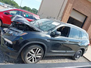 2017 Honda Pilot Touring with VIN 5FNYF5H91HB038268, listed as a IAAI auction lot 42786448 with 62,195 mi miles and . Bid and sale history available at DreamBid. Image 15.