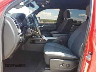 2021 Ram 1500 Lone Star with VIN 1C6RREFTXMN630958, listed as a Copart auction lot 55039995 with 53,497 mi miles and Salvage title. Bid and sale history available at DreamBid. Image 7.