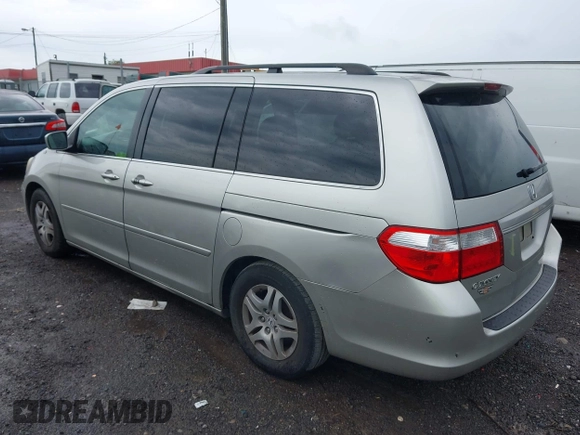 2007 Honda Odyssey EX-L with VIN 5FNRL38787B455417, listed as a IAAI auction lot 42104303 with 214,482 mi miles and . Bid and sale history available at DreamBid. Image 3.