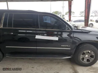 2020 GMC Yukon XL Denali with VIN 1GKS1HKJ6LR127236, listed as a Copart auction lot 51928885 with 143,579 mi miles and Salvage Title. Bid and sale history available at carsss.com. Image 13.