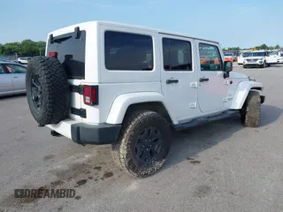 2016 Jeep Wrangler Unlimited Sahara z VIN 1C4HJWEG5GL172350, wystawiony jako IAAI lot #39987533 z przebiegiem 158 540 mil mil oraz . Historia ofert i sprzedaży dostępna na DreamBid. Obrazek 4.