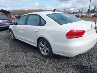 2013 Volkswagen Passat Wolfsburg Edition with VIN 1VWAP7A39DC132046, listed as a IAAI auction lot 41829115 with 122,660 mi miles. Bid and sale history available at carsss.com. Image 3.