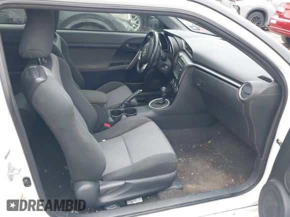 2014 Scion tC with VIN JTKJF5C73E3074035, listed as a IAAI auction lot 41426238 with 116,469 mi miles. Bid and sale history available at carsss.com. Image 5.