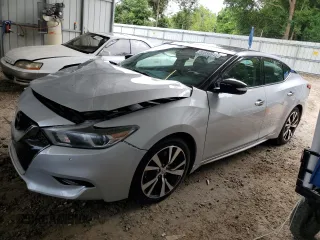 2017 Nissan Maxima SL with VIN 1N4AA6AP8HC396551, listed as a Copart auction lot 60086645 with 102,337 mi miles and Salvage title. Bid and sale history available at DreamBid. Image 1.