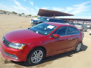2017 Volkswagen Jetta S z VIN 3VW2B7AJ2HM207207, wystawiony jako IAAI lot #41654971 z przebiegiem 73 427 mil mil oraz . Historia ofert i sprzedaży dostępna na DreamBid. Obrazek 14.