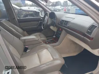 1996 Mercedes-Benz S with VIN WDBGA57E8TA318326, listed as a IAAI auction lot 42072979 with 97,504 mi miles and . Bid and sale history available at DreamBid. Image 5.