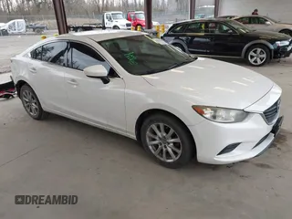 2014 Mazda 6 i Sport with VIN JM1GJ1U52E1103784, listed as a IAAI auction lot 41824397 with 141,140 mi miles. Bid and sale history available at carsss.com. Image 1.