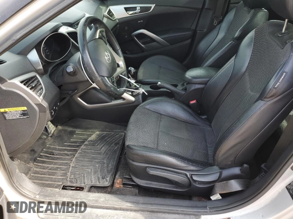2013 Hyundai Veloster w/Black Int с VIN KMHTC6AD4DU139261, выставлен на аукционе Copart как лот 56175095 с пробегом 148 483 миль миль и Чистый • Clean title. История ставок и продаж доступна на DreamBid. Изображение 7.