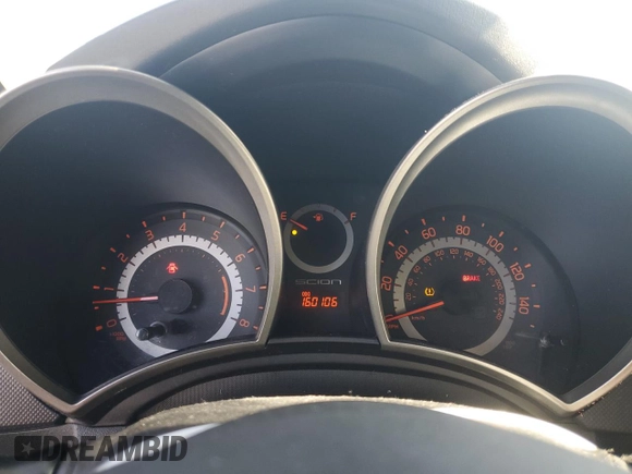 2012 Scion tC z VIN JTKJF5C78C3040542, wystawiony jako Copart lot #43595925 z przebiegiem 160 106 mil mil oraz Szkoda całkowita • Salvage title. Historia ofert i sprzedaży dostępna na DreamBid. Obrazek 9.