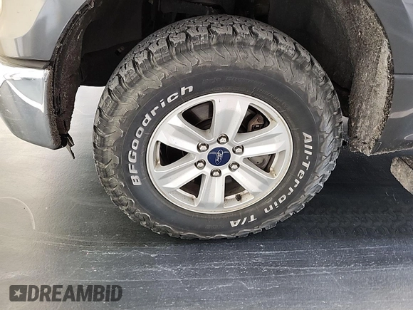 2016 Ford F-150 XLT with VIN 1FTFX1EF7GKE19857, listed as a IAAI auction lot 42148063 with 112,511 mi miles. Bid and sale history available at carsss.com. Image 1.