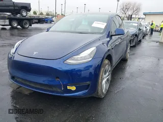 2022 Tesla Model Y Long Range with VIN 7SAYGDEE7NF409294, listed as a IAAI auction lot 41845261 with 73,116 mi miles and . Bid and sale history available at DreamBid. Image 19.