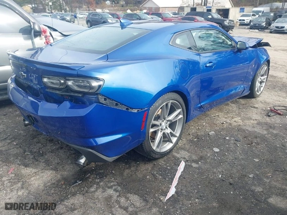 2021 Chevrolet Camaro 1LT with VIN 1G1FB1RX6M0134844, listed as a IAAI auction lot 41059096 with 130989 miles. Bid and sale history available at carsss.com. Image 4.