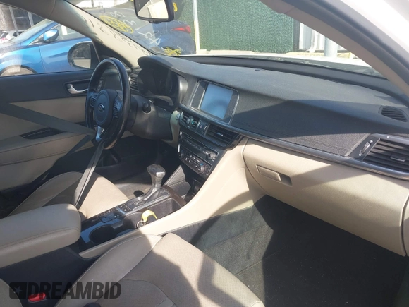 2016 Kia Optima EX with VIN 5XXGU4L32GG070138, listed as a IAAI auction lot 42138810 with 131,040 mi miles. Bid and sale history available at carsss.com. Image 5.