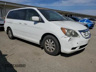 2010 Honda Odyssey EX-L with VIN 5FNRL3H77AB051869, listed as a Copart auction lot 48473815 with 248,511 mi miles and Salvage Title. Bid and sale history available at DreamBid. Image 4.