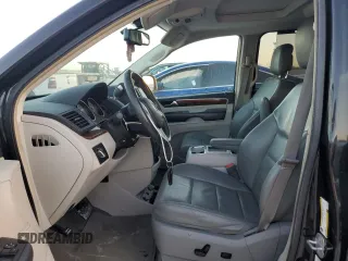 2013 Volkswagen Routan z VIN 2C4RVADG8DR725749, wystawiony jako Copart lot #77624324 z przebiegiem 156 557 mil mil oraz Czysty tytuł • Clean title. Historia ofert i sprzedaży dostępna na DreamBid. Obrazek 7.