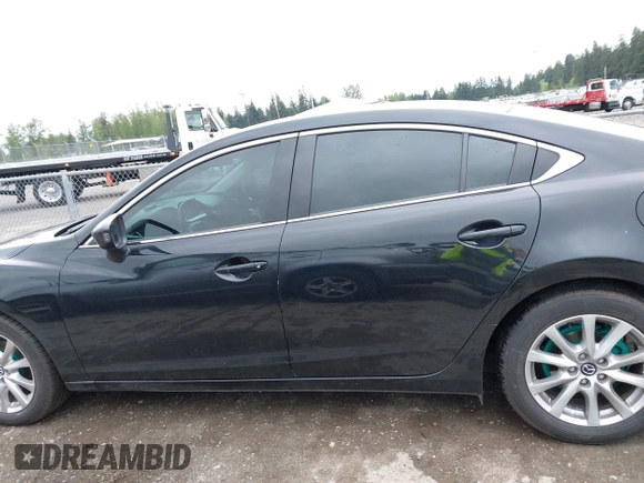2016 Mazda 6 i Sport with VIN JM1GJ1U53G1451578, listed as a IAAI auction lot 42134810 with 113,144 mi miles and . Bid and sale history available at DreamBid. Image 14.