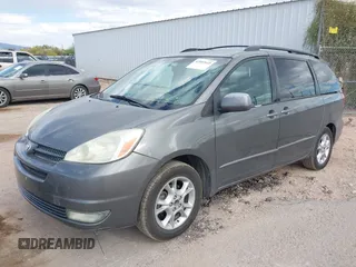 2005 Toyota Sienna XLE with VIN 5TDZA22C55S227647, listed as a IAAI auction lot 42007645 with 183,114 mi miles and . Bid and sale history available at carsss.com. Image 2.