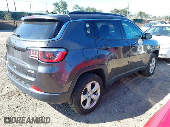 2018 Jeep Compass Altitude with VIN 3C4NJDBBXJT202826, listed as a IAAI auction lot 42012645 with 125,839 mi miles and . Bid and sale history available at carsss.com. Image 4.