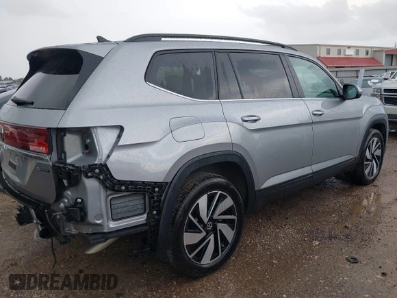 2025 Volkswagen Atlas SE z VIN 1V2HR2CA8SC531486, wystawiony jako IAAI lot #42508906 z przebiegiem 10 565 mil mil oraz . Historia ofert i sprzedaży dostępna na DreamBid. Obrazek 4.