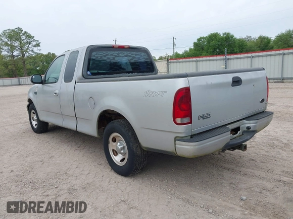 2002 Ford F-150 XL with VIN 1FTRX17282NA84011, listed as a IAAI auction lot 41871210 with 1 mi miles. Bid and sale history available at carsss.com. Image 3.