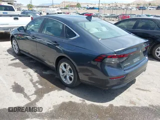 2023 Honda Accord Sedan LX with VIN 1HGCY1F28PA004601, listed as a IAAI auction lot 42031327 with 48,996 mi miles. Bid and sale history available at carsss.com. Image 3.