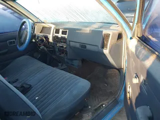 1993 Nissan Trucks 2WD with VIN 1N6SD11S1PC310246, listed as a IAAI auction lot 41838011 with 219,398 mi miles. Bid and sale history available at carsss.com. Image 5.