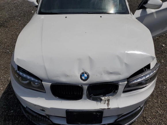 2010 BMW 1 Series 128i with VIN WBAUN1C50AVH81851, listed as a Copart auction lot 56607275 with 145,036 mi miles and Salvage title. Bid and sale history available at DreamBid. Image 11.