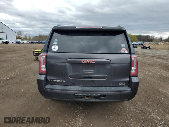 2016 GMC Yukon XL SLT with VIN 1GKS2GKC3GR282521, listed as a Copart auction lot 53453175 with 102,250 mi miles and Salvage Title. Bid and sale history available at carsss.com. Image 6.