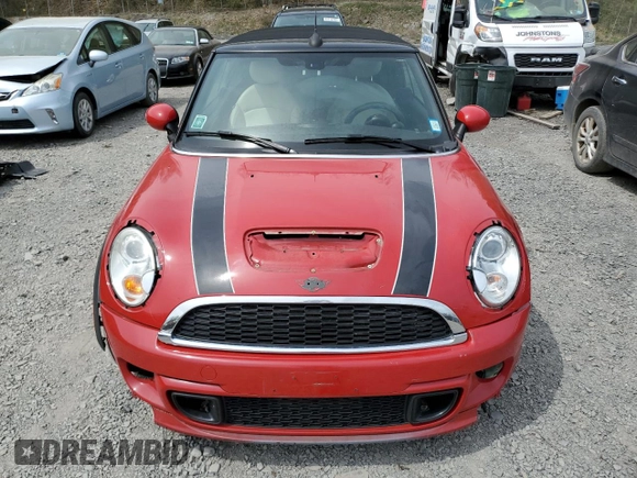 2013 MINI Convertible S с VIN WMWZP3C59DT706087, выставлен на аукционе Copart как лот 54504375 с пробегом 100 550 миль миль и Списание • Salvage title. История ставок и продаж доступна на DreamBid. Изображение 5.