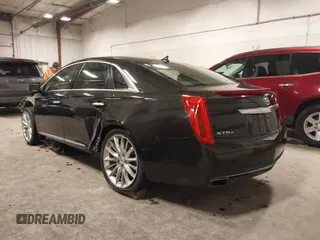 2014 Cadillac XTS Platinum with VIN 2G61W5S88E9186969, listed as a IAAI auction lot 41422872 with 184,998 mi miles and . Bid and sale history available at DreamBid. Image 3.