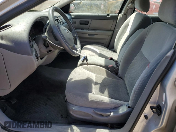 2004 Ford Taurus SE with VIN 1FAFP53U34A132063, listed as a Copart auction lot 58622055 with 96,858 mi miles and Clean title. Bid and sale history available at DreamBid. Image 7.