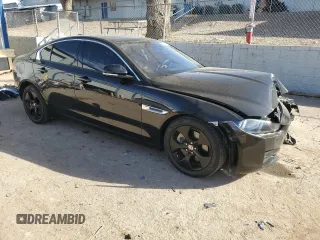 2017 Jaguar XE 25t with VIN SAJAR4BG3HA948489, listed as a Copart auction lot 86930544 with 68,674 mi miles and Salvage Title. Bid and sale history available at DreamBid. Image 4.