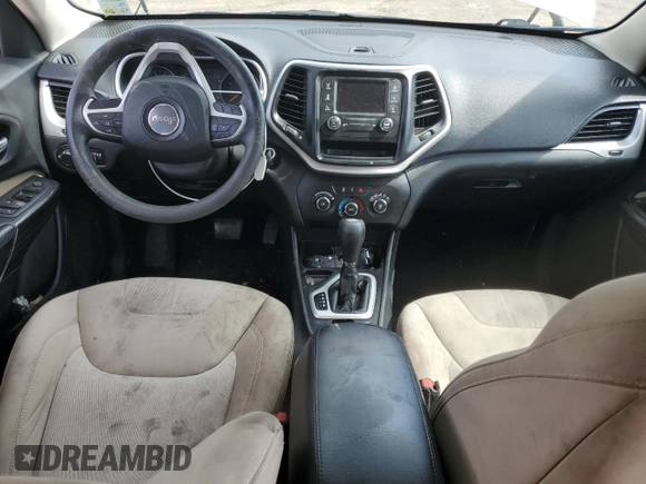 2015 Jeep Cherokee Sport z VIN 1C4PJLAB9FW547402, wystawiony jako Copart lot #53164885 z przebiegiem 128 717 mil mil oraz Szkoda całkowita • Salvage title. Historia ofert i sprzedaży dostępna na DreamBid. Obrazek 8.