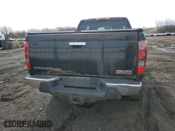 2012 GMC Canyon SLE1 with VIN 1GTJ6MFEXC8114414, listed as a Copart auction lot 52058665 with 219,538 mi miles and Clean title. Bid and sale history available at DreamBid. Image 6.