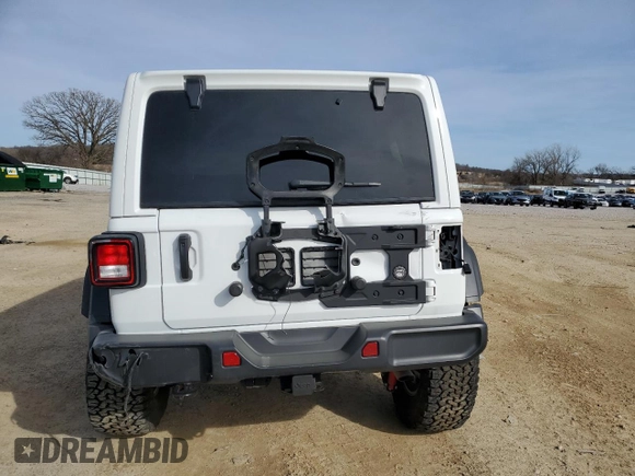 2023 Jeep Wrangler Sport S with VIN 1C4HJXDGXPW665818, listed as a Copart auction lot 48357105 with 9,803 mi miles and Clean Title. Bid and sale history available at DreamBid. Image 6.