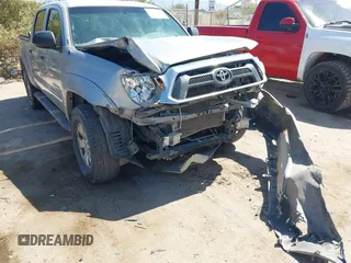2015 Toyota Tacoma with VIN 3TMLU4EN6FM188736, listed as a IAAI auction lot 42605859 with 210,717 mi miles and . Bid and sale history available at DreamBid. Image 6.