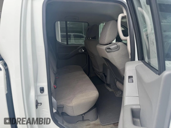 2013 Nissan Frontier SV z VIN 1N6AD0EV0DN741171, wystawiony jako Copart lot #60908845 z przebiegiem 169 234 mil mil oraz Czysty tytuł • Clean title. Historia ofert i sprzedaży dostępna na DreamBid. Obrazek 6.
