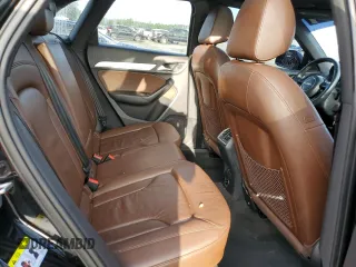 2015 Audi Q3 Premium Plus with VIN WA1BFCFS0FR010544, listed as a Copart auction lot 69989353 with 95,636 mi miles and . Bid and sale history available at DreamBid. Image 11.