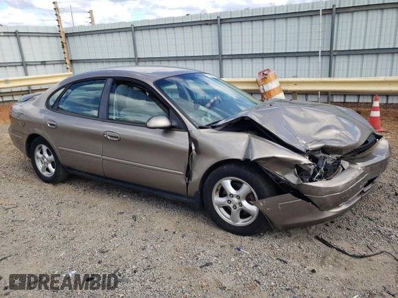 2002 Ford Taurus SES Standard with VIN 1FAFP55242A259784, listed as a Copart auction lot 76028114 with 90,079 mi miles and Clean Title. Bid and sale history available at DreamBid. Image 4.