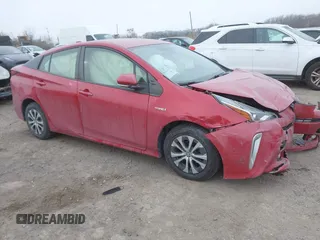 2021 Toyota Prius LE z VIN JTDL9MFU2M3026544, wystawiony jako IAAI lot #41336274 z przebiegiem 76 055 mil mil oraz . Historia ofert i sprzedaży dostępna na DreamBid. Obrazek 1.
